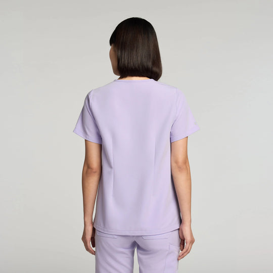 Jaanuu Scrubs Women's Rhena Essential 1-Pocket Scrub Top Lavender | scrub-supply.com