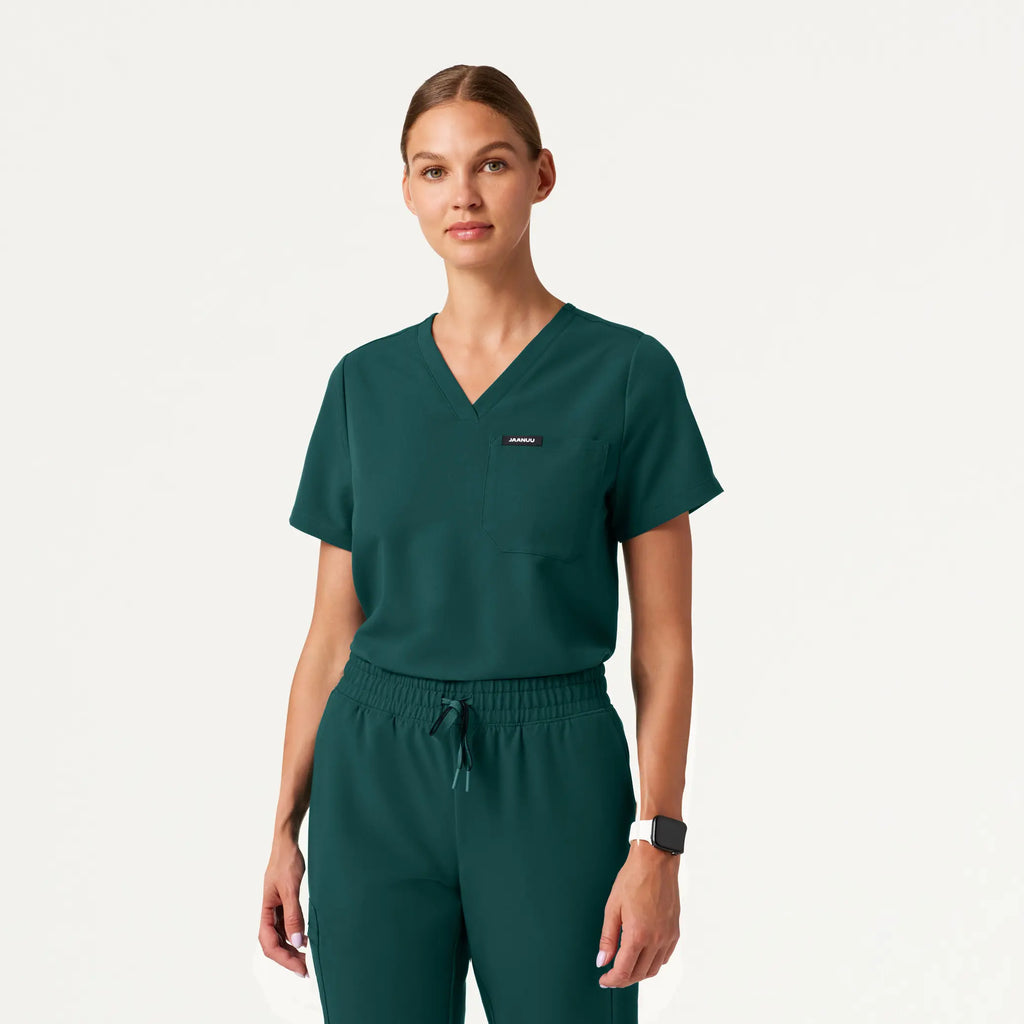 Jaanuu Scrubs Women's Rhena Essential 1-Pocket Scrub Top Midnight Green | scrub-supply.com