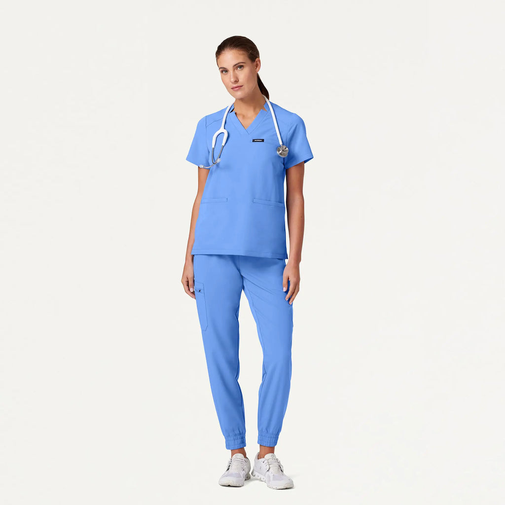 Jaanuu Scrubs Women's Helia Notched V-Neck Scrub Top Ceil Blue | scrub-supply.com