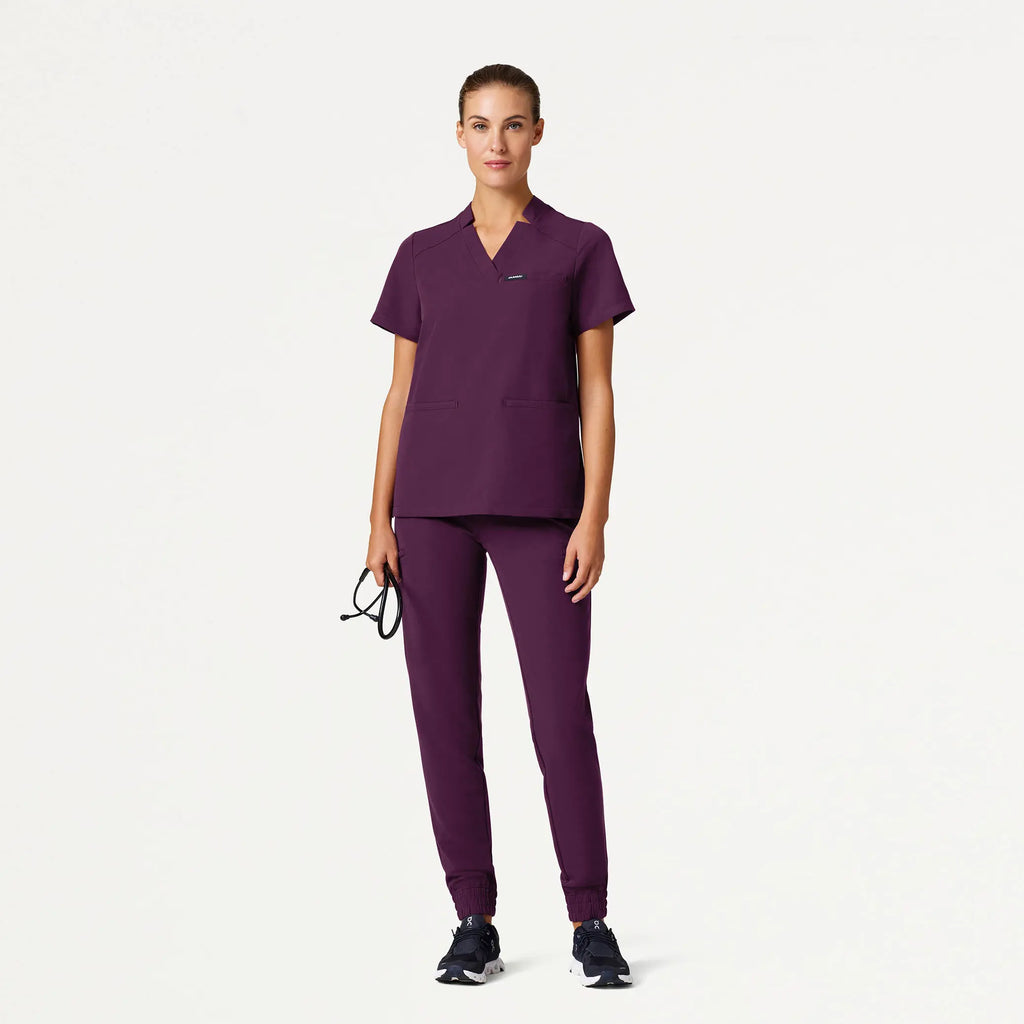 Jaanuu Scrubs Women's Helia Notched V-Neck Scrub Top Dark Amethyst | scrub-supply.com