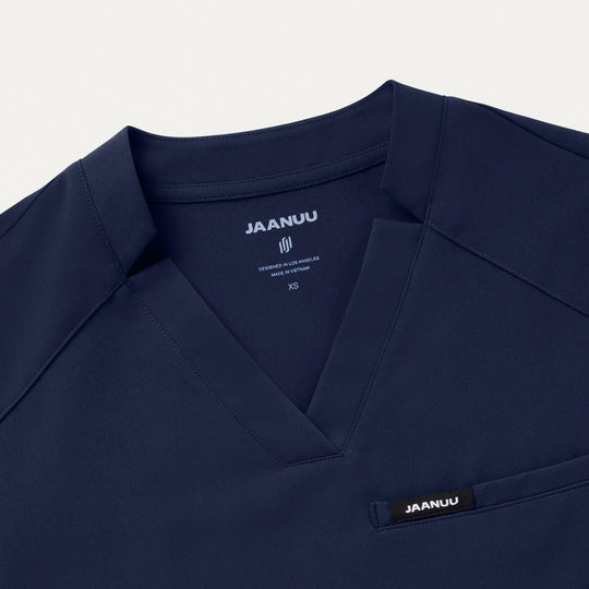 Jaanuu Scrubs Women's Helia Notched V-Neck Scrub Top Midnight Navy | scrub-supply.com