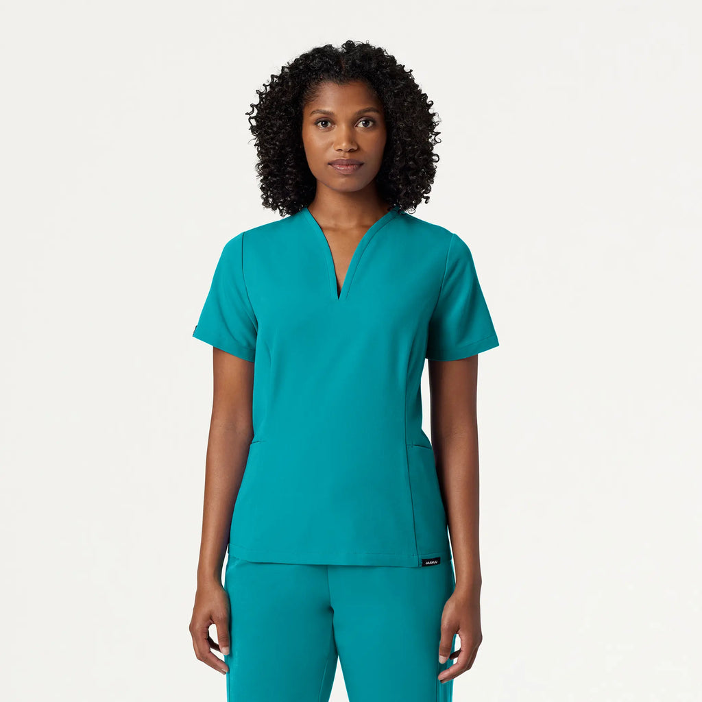 Jaanuu Scrubs Women's Calix Fit & Flare Scrub Top Aqua | scrub-supply.com