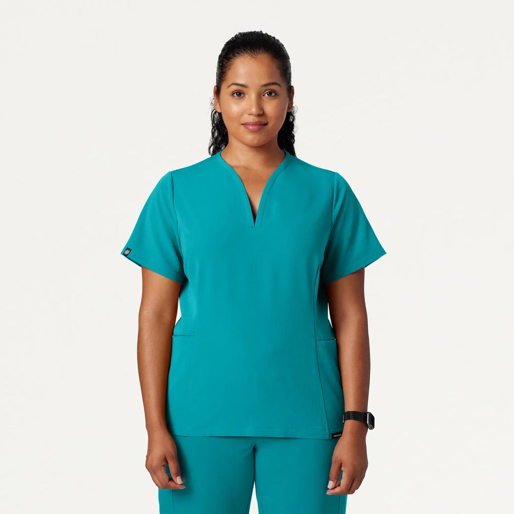 Jaanuu Scrubs Women's Calix Fit & Flare Scrub Top Aqua | scrub-supply.com