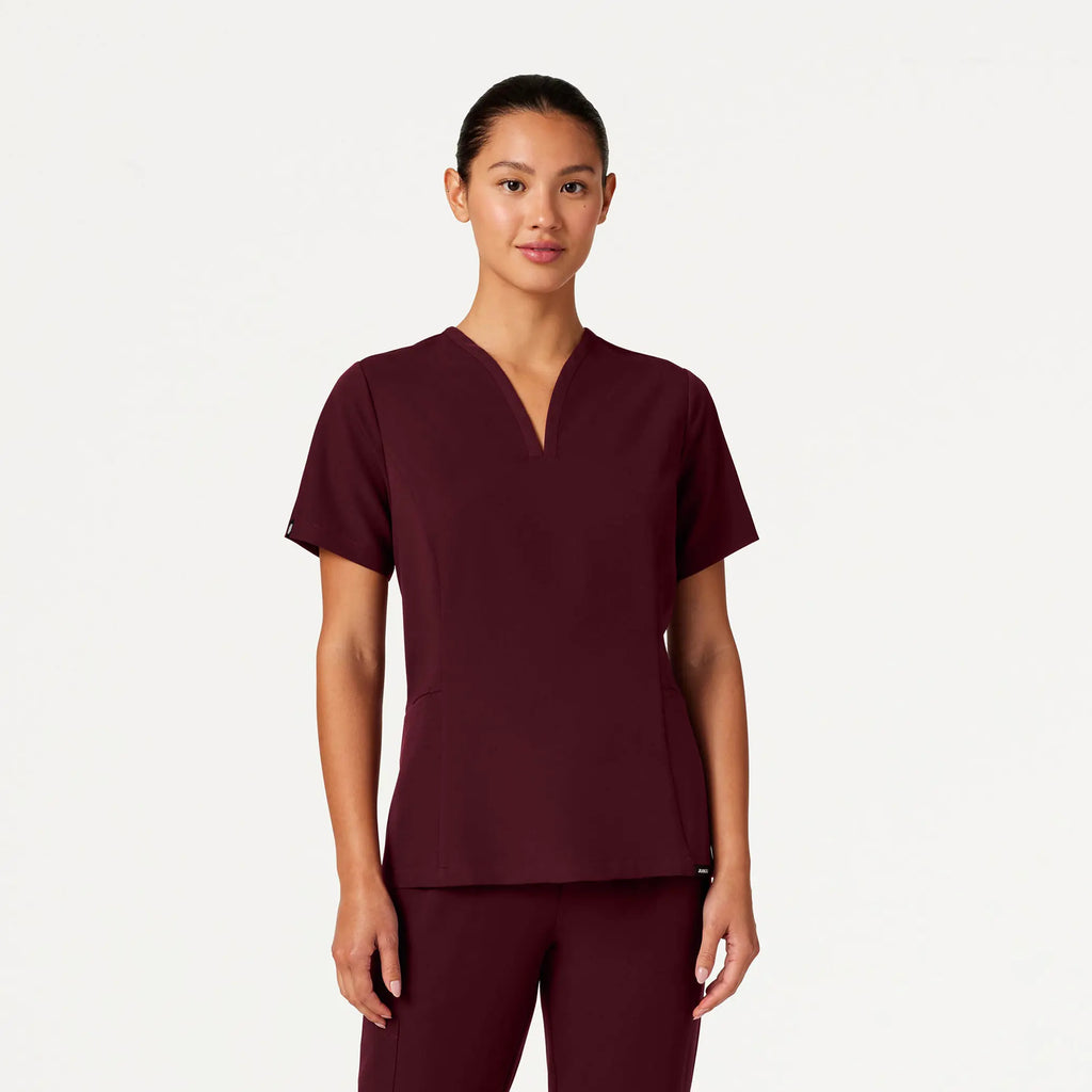 Jaanuu Scrubs Women's Calix Fit & Flare Scrub Top Burgundy | scrub-supply.com