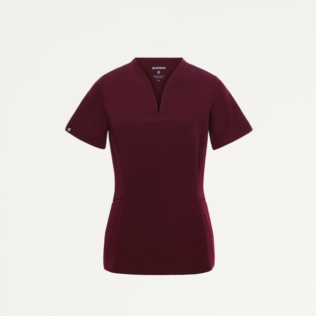 Jaanuu Scrubs Women's Calix Fit & Flare Scrub Top Burgundy | scrub-supply.com