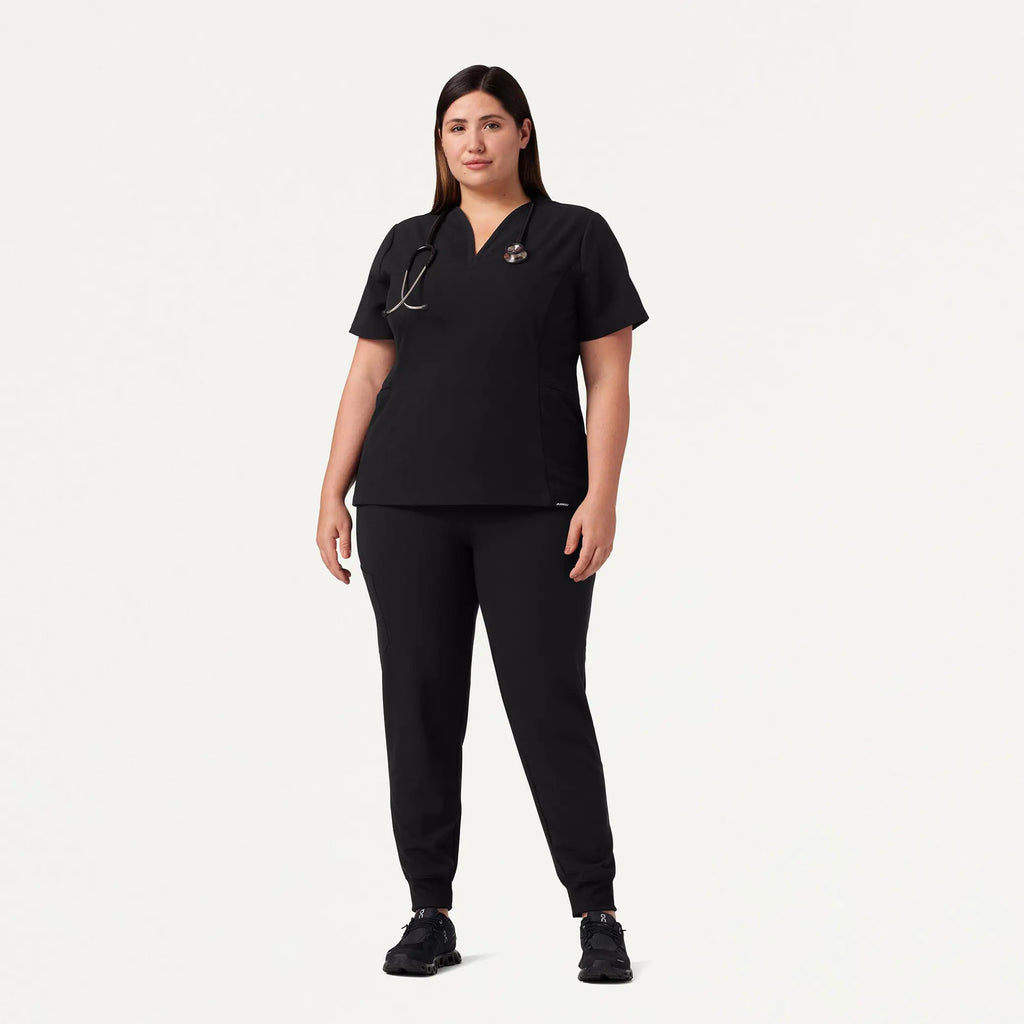 Jaanuu Scrubs Women's Calix Fit & Flare Scrub Top Black | scrub-supply.com