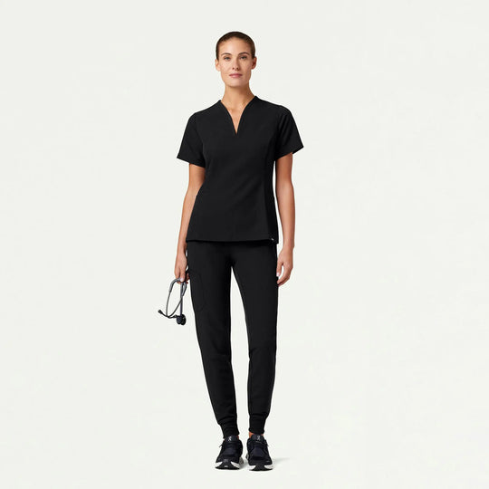Jaanuu Scrubs Women's Calix Fit & Flare Scrub Top Black | scrub-supply.com