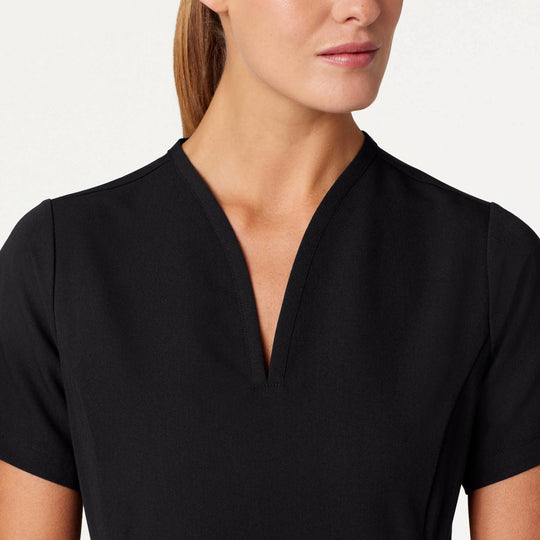 Jaanuu Scrubs Women's Calix Fit & Flare Scrub Top Black | scrub-supply.com