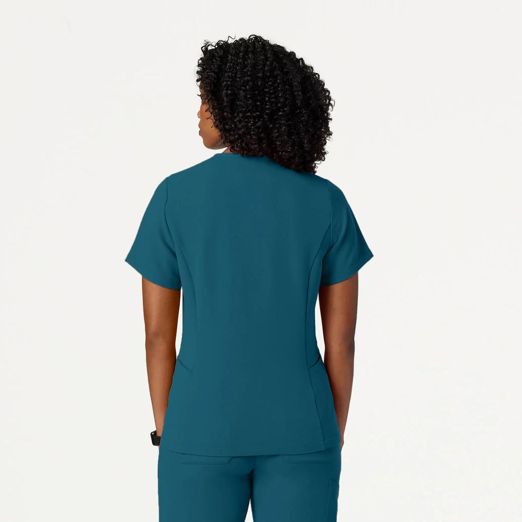 Jaanuu Scrubs Women's Calix Fit & Flare Scrub Top Caribbean Blue | scrub-supply.com