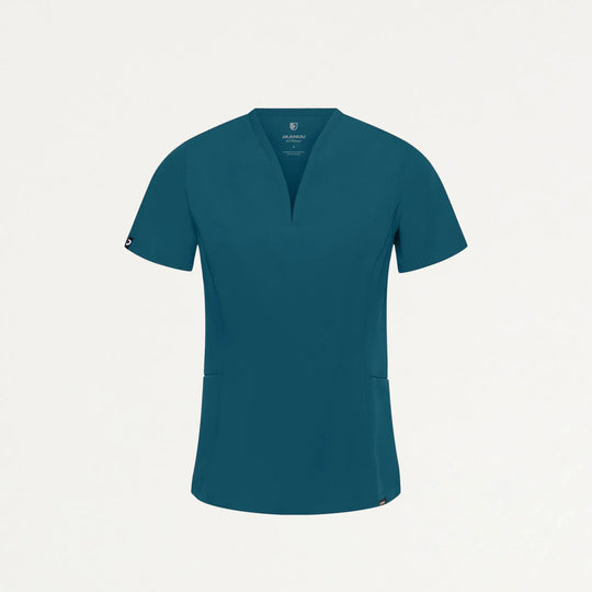 Jaanuu Scrubs Women's Calix Fit & Flare Scrub Top Caribbean Blue | scrub-supply.com