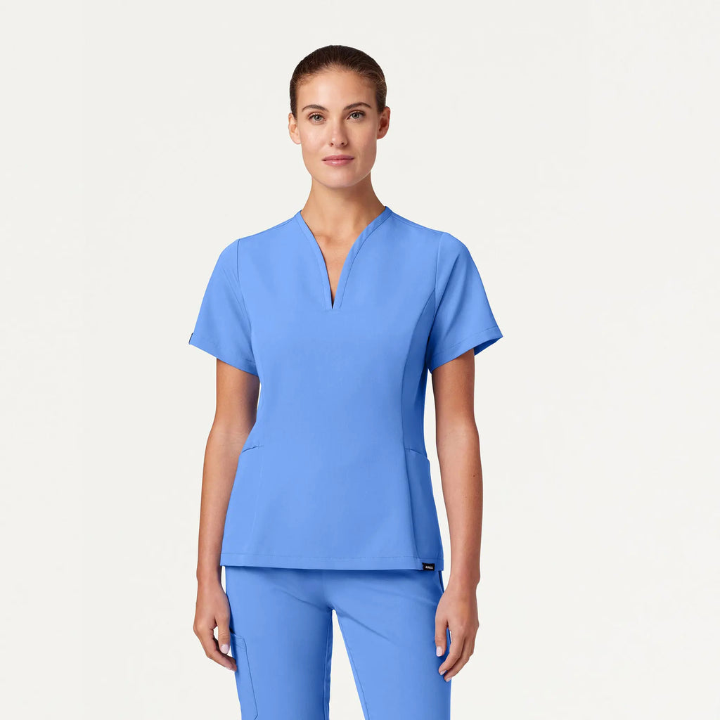 Jaanuu Scrubs Women's Calix Fit & Flare Scrub Top Ceil Blue | scrub-supply.com