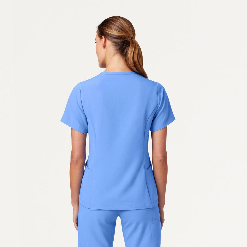 Jaanuu Scrubs Women's Calix Fit & Flare Scrub Top Ceil Blue | scrub-supply.com