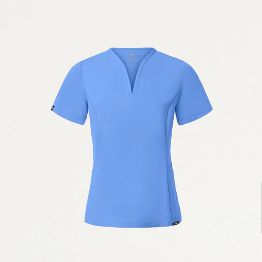 Jaanuu Scrubs Women's Calix Fit & Flare Scrub Top Ceil Blue | scrub-supply.com