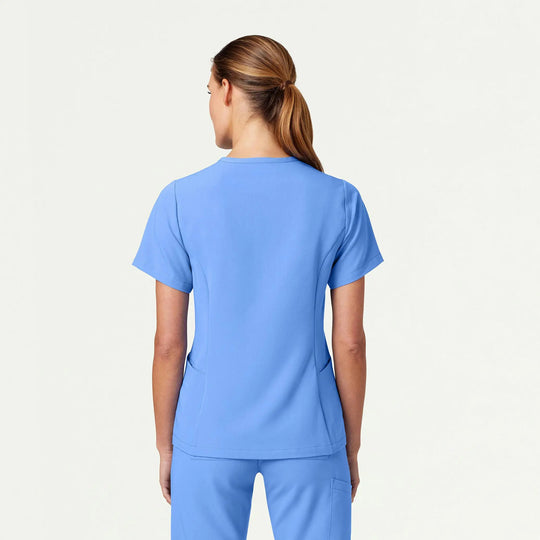 Jaanuu Scrubs Women's Calix Fit & Flare Scrub Top Ceil Blue | scrub-supply.com