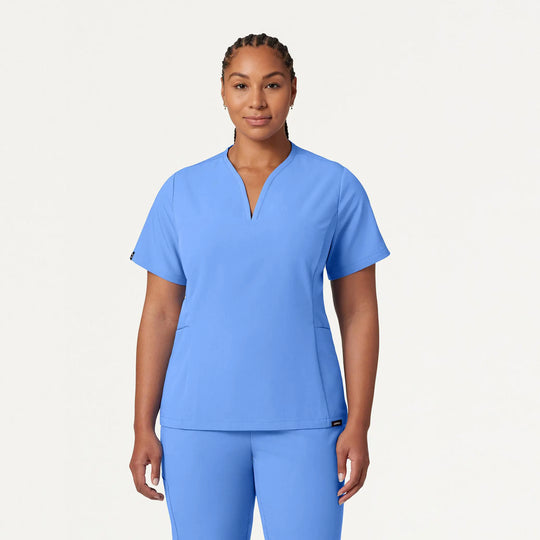 Jaanuu Scrubs Women's Calix Fit & Flare Scrub Top Ceil Blue | scrub-supply.com