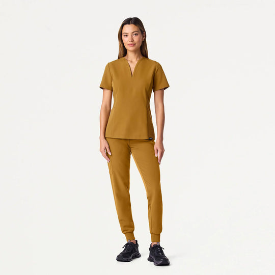 Jaanuu Scrubs Women's Calix Fit & Flare Scrub Top Cider | scrub-supply.com