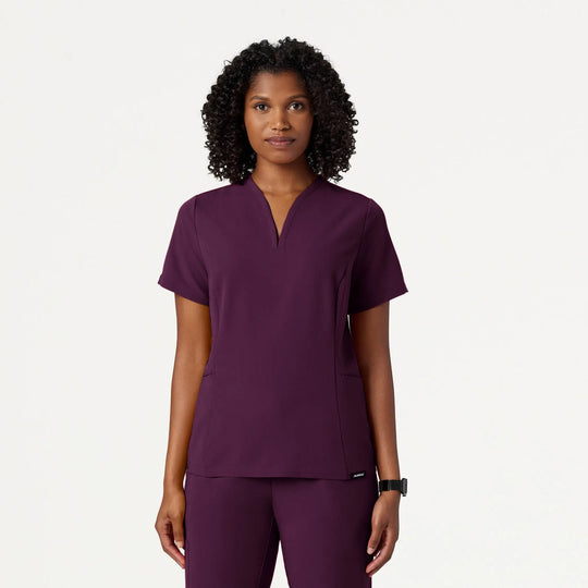 Jaanuu Scrubs Women's Calix Fit & Flare Scrub Top Deep Eggplant | scrub-supply.com