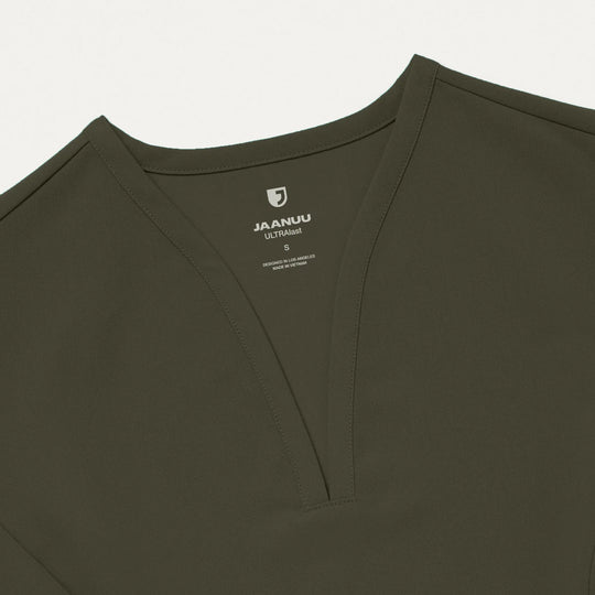 Jaanuu Scrubs Women's Calix Fit & Flare Scrub Top Deep Olive | scrub-supply.com