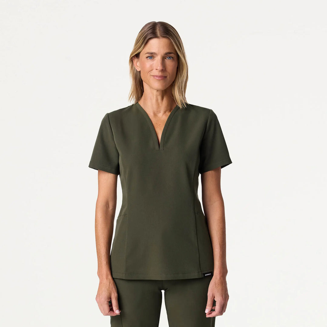 Jaanuu Scrubs Women's Calix Fit & Flare Scrub Top Deep Olive | scrub-supply.com
