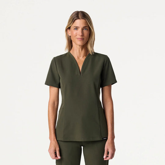 Jaanuu Scrubs Women's Calix Fit & Flare Scrub Top Deep Olive | scrub-supply.com