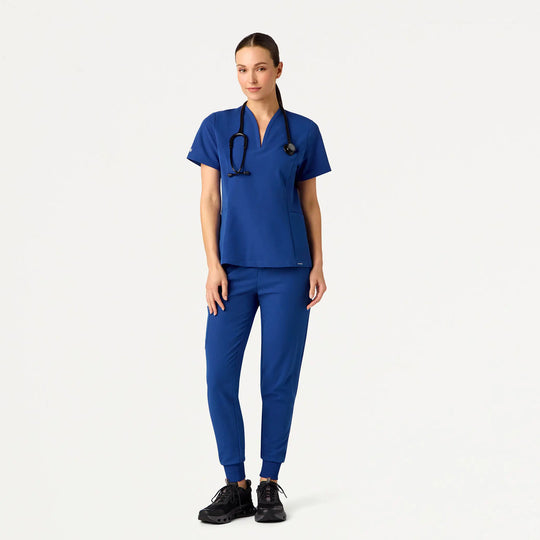 Jaanuu Scrubs Women's Calix Fit & Flare Scrub Top Galaxy | scrub-supply.com