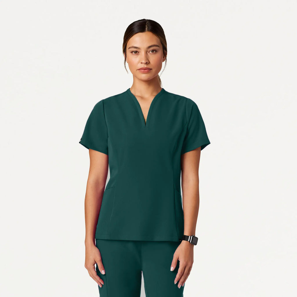 Jaanuu Scrubs Women's Calix Fit & Flare Scrub Top Midnight Green | scrub-supply.com