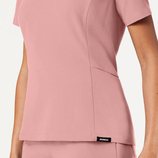 Jaanuu Scrubs Women's Calix Fit & Flare Scrub Top Mauve | scrub-supply.com
