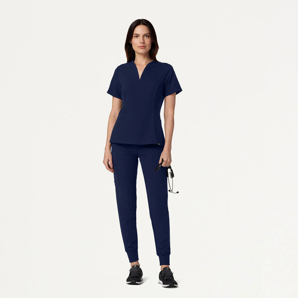 Jaanuu Scrubs Women's Calix Fit & Flare Scrub Top Midnight Navy | scrub-supply.com