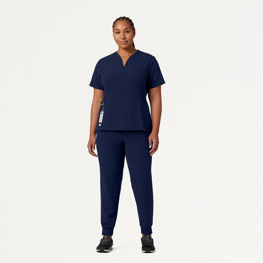 Jaanuu Scrubs Women's Calix Fit & Flare Scrub Top Midnight Navy | scrub-supply.com