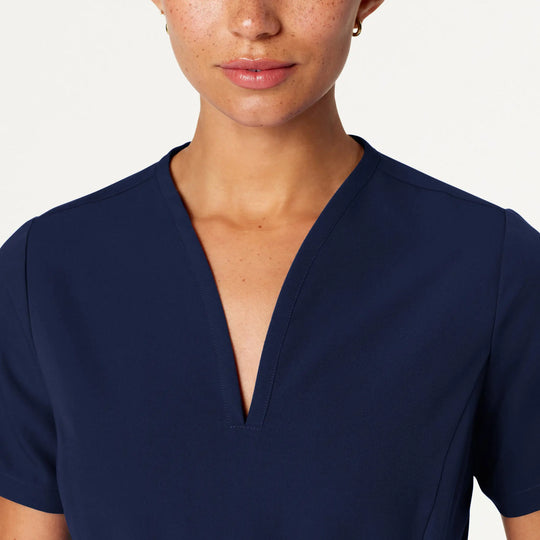 Jaanuu Scrubs Women's Calix Fit & Flare Scrub Top Midnight Navy | scrub-supply.com