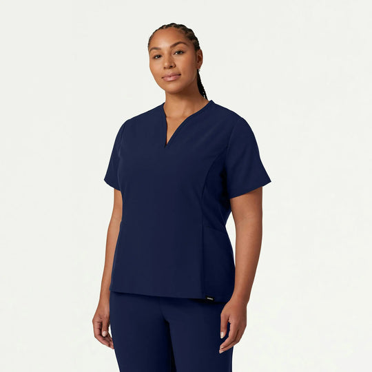 Jaanuu Scrubs Women's Calix Fit & Flare Scrub Top Midnight Navy | scrub-supply.com