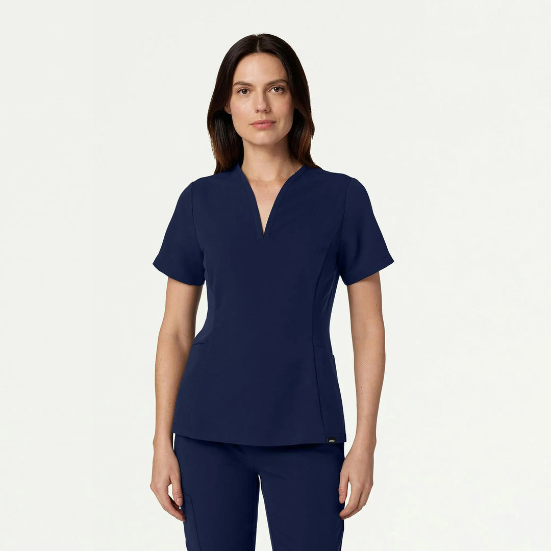 Jaanuu Scrubs Women's Calix Fit & Flare Scrub Top Midnight Navy | scrub-supply.com