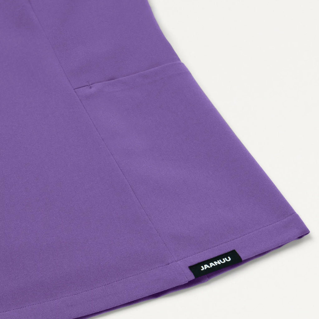 Jaanuu Scrubs Women's Calix Fit & Flare Scrub Top Violet | scrub-supply.com