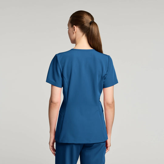 Jaanuu Scrubs Women's Calix Fit & Flare Scrub Top Ocean | scrub-supply.com