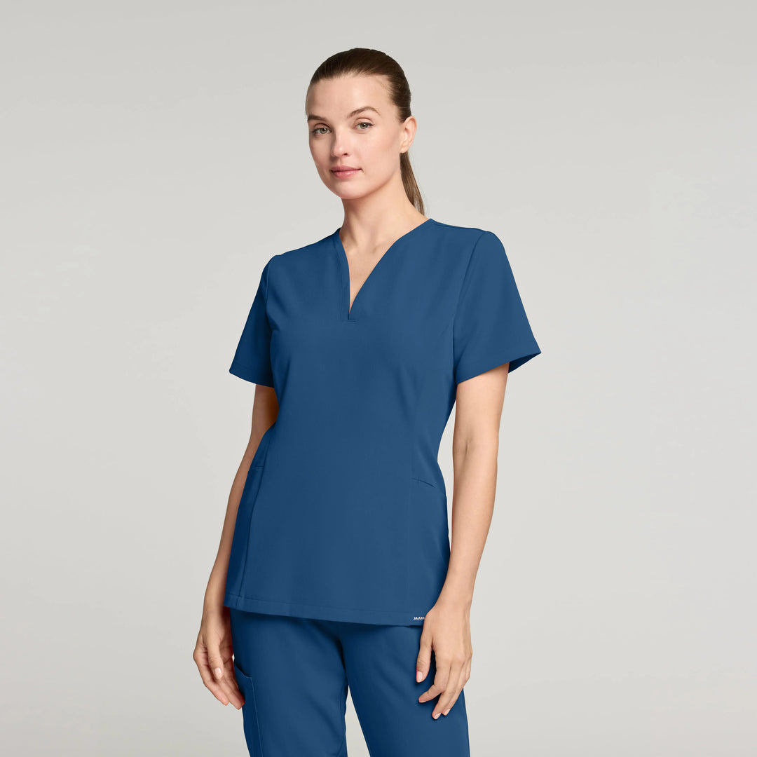 Jaanuu Scrubs Women's Calix Fit & Flare Scrub Top Ocean | scrub-supply.com