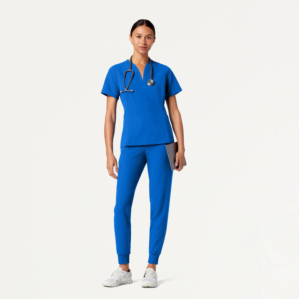 Jaanuu Scrubs Women's Calix Fit & Flare Scrub Top Royal Blue | scrub-supply.com