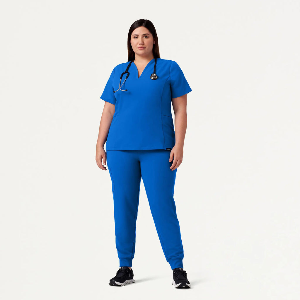 Jaanuu Scrubs Women's Calix Fit & Flare Scrub Top Royal Blue | scrub-supply.com