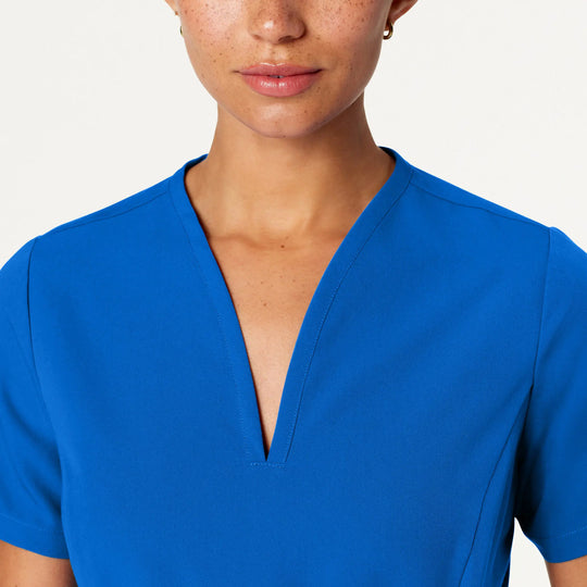 Jaanuu Scrubs Women's Calix Fit & Flare Scrub Top Royal Blue | scrub-supply.com