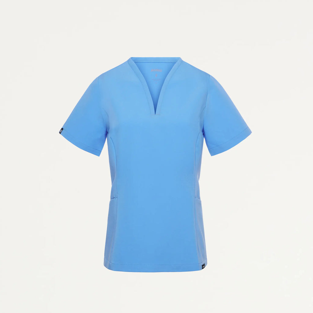 Jaanuu Scrubs Women's Calix Fit & Flare Scrub Top Sky Blue | scrub-supply.com