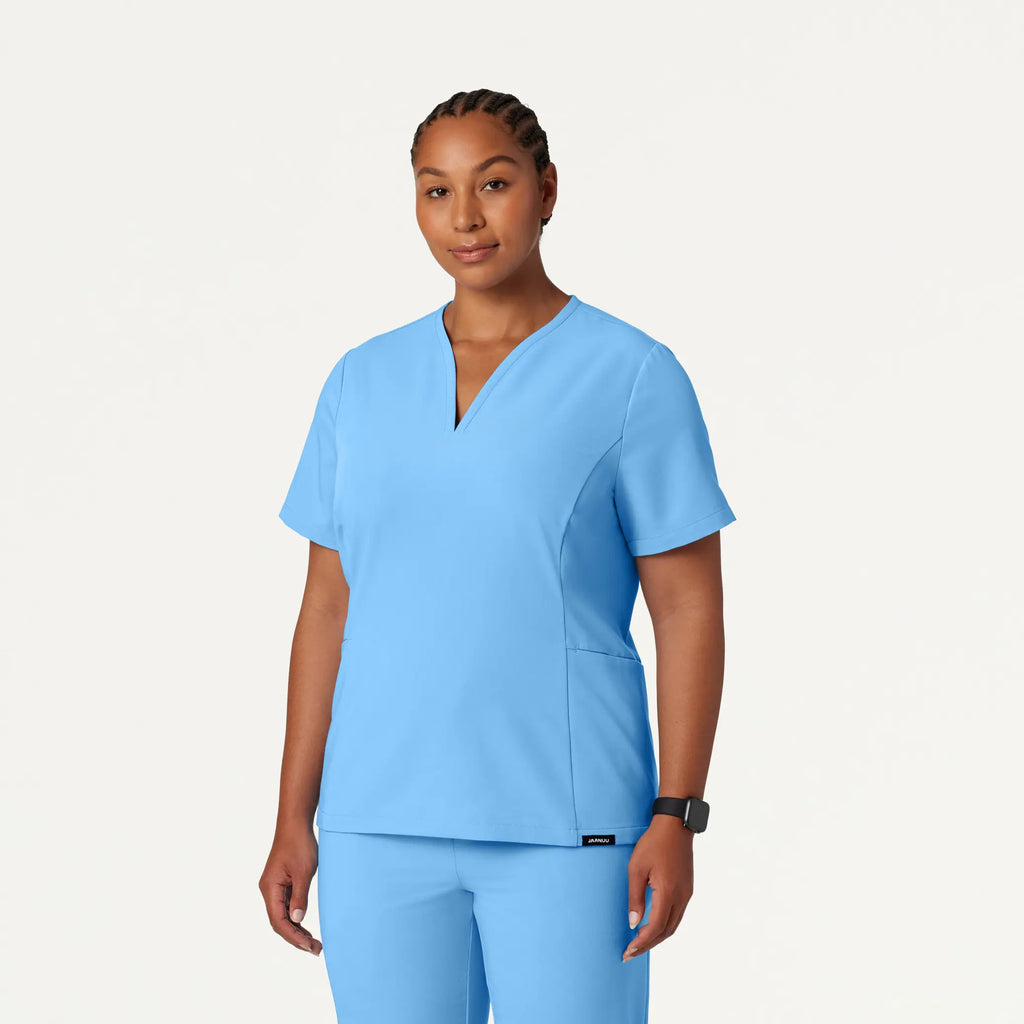 Jaanuu Scrubs Women's Calix Fit & Flare Scrub Top Sky Blue | scrub-supply.com