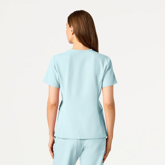 Jaanuu Scrubs Women's Calix Fit & Flare Scrub Top Sky Blue | scrub-supply.com