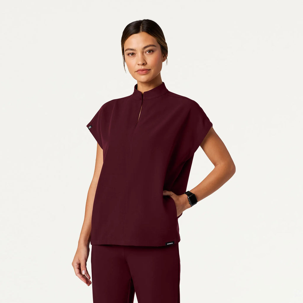 Jaanuu Scrubs Women's Aris Oversized 2-Pocket Scrub Top Burgundy | scrub-supply.com