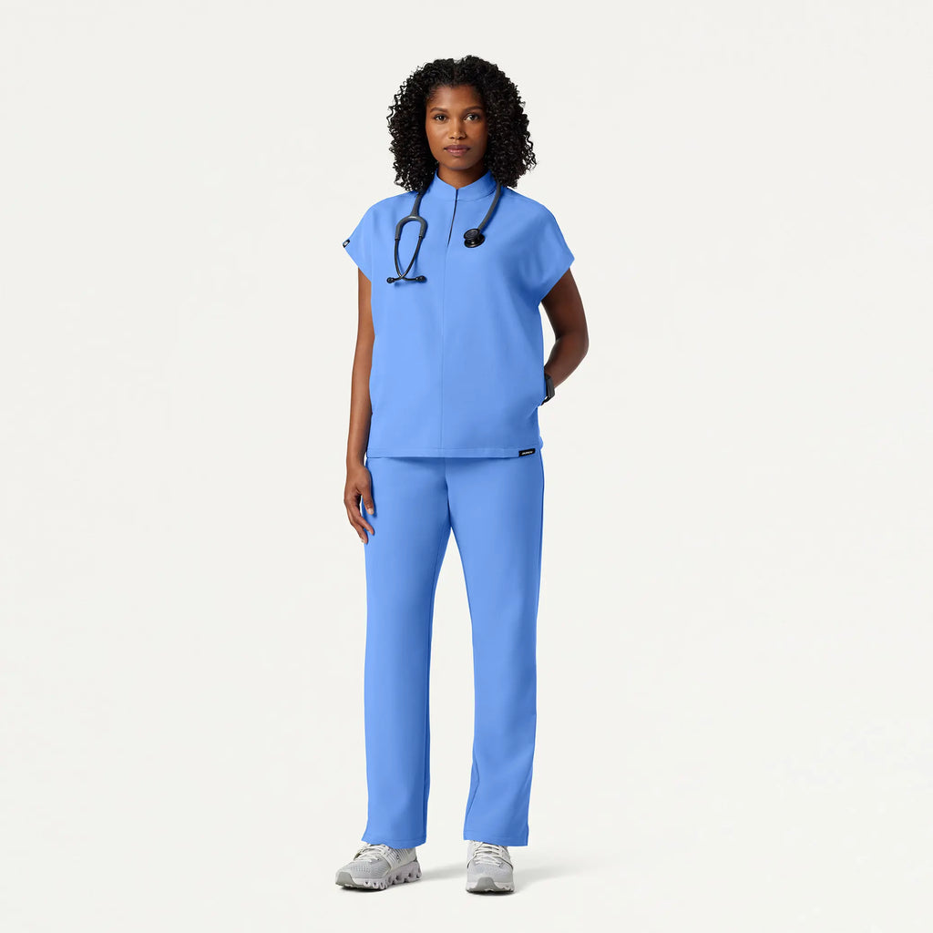 Jaanuu Scrubs Women's Aris Oversized 2-Pocket Scrub Top Ceil Blue | scrub-supply.com