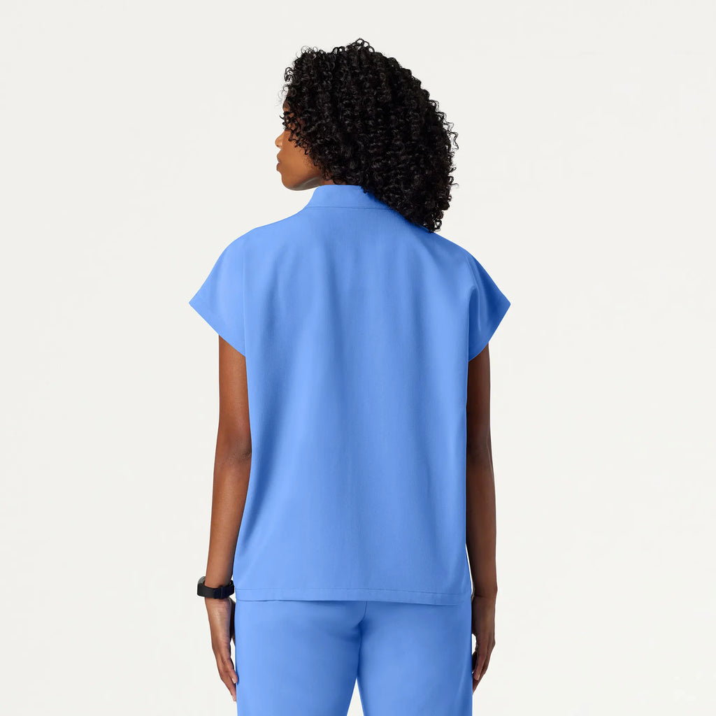 Jaanuu Scrubs Women's Aris Oversized 2-Pocket Scrub Top Ceil Blue | scrub-supply.com