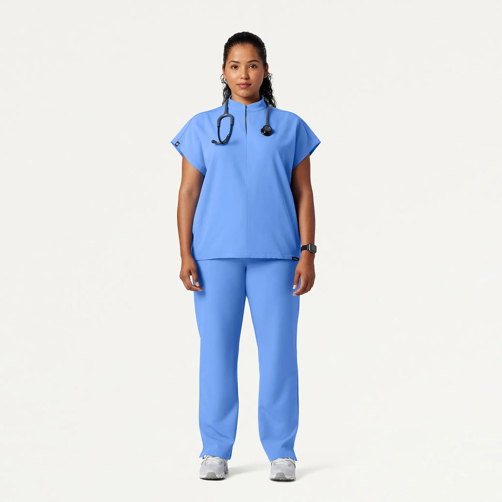 Jaanuu Scrubs Women's Aris Oversized 2-Pocket Scrub Top Ceil Blue | scrub-supply.com