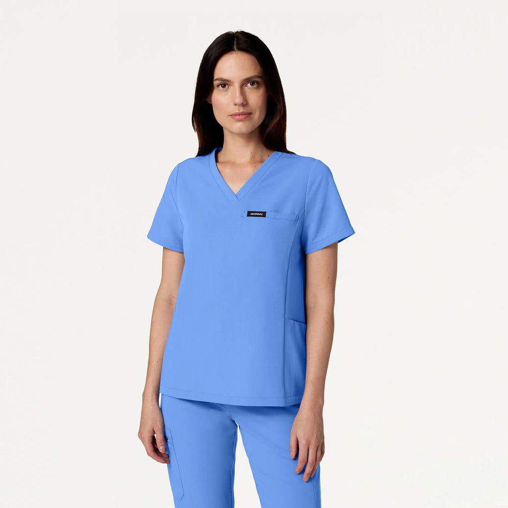 Jaanuu Scrubs Women's Magna 3-Pocket Scrub Top Ceil Blue | scrub-supply.com