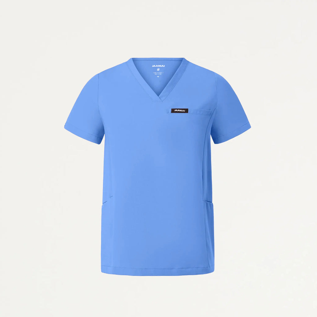 Jaanuu Scrubs Women's Magna 3-Pocket Scrub Top Ceil Blue | scrub-supply.com