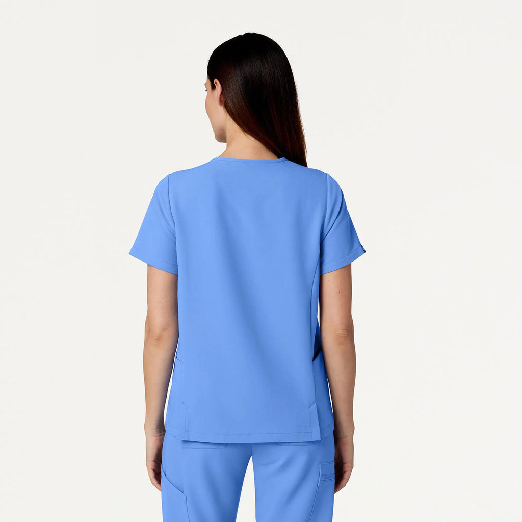 Jaanuu Scrubs Women's Magna 3-Pocket Scrub Top Ceil Blue | scrub-supply.com