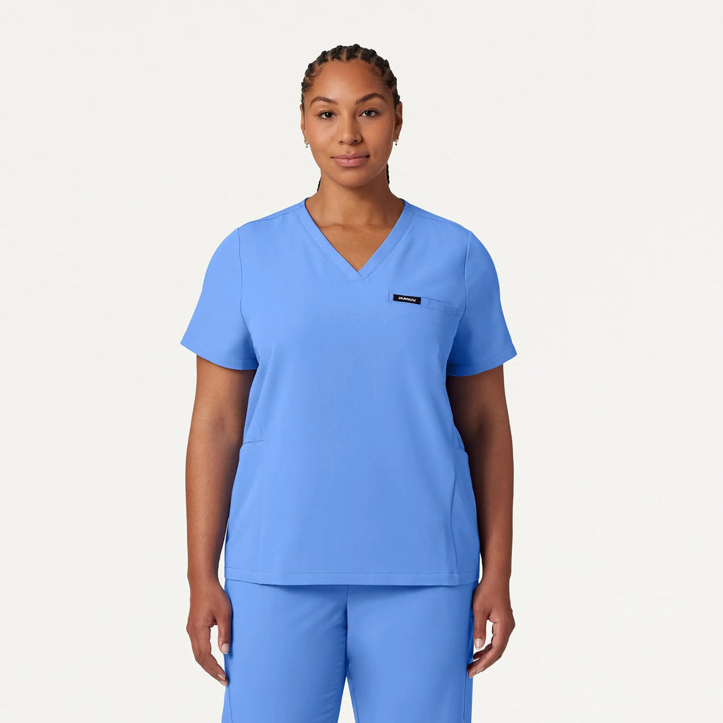 Jaanuu Scrubs Women's Magna 3-Pocket Scrub Top Ceil Blue | scrub-supply.com