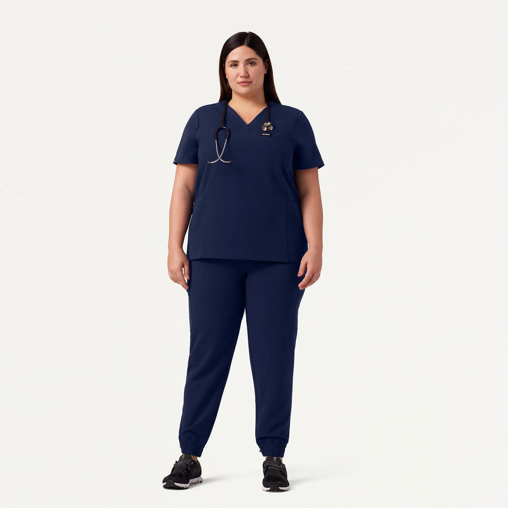 Jaanuu Scrubs Women's Magna 3-Pocket Scrub Top Midnight Navy | scrub-supply.com